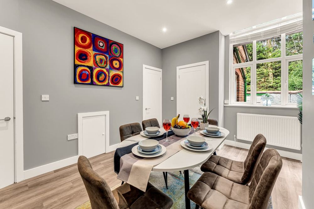 Dining area at Chic 3-Bedroom House
