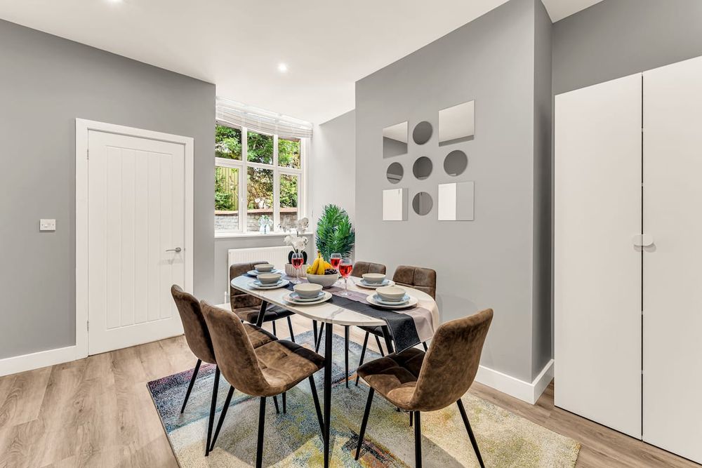Dining area at Chic 3-Bedroom House