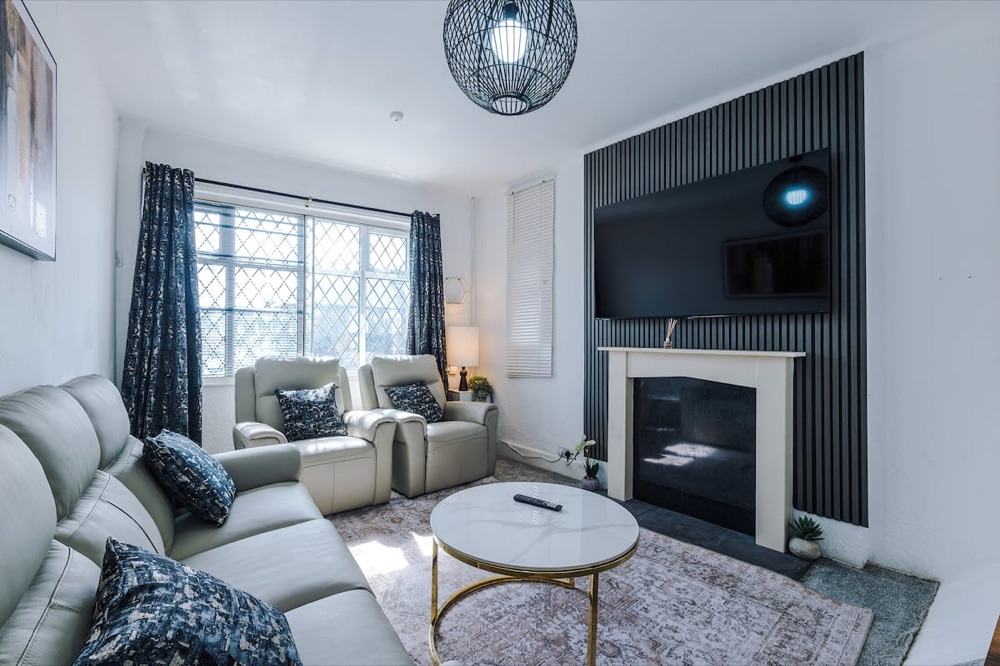 Living room at Luxury 3-Bedroom Apartment