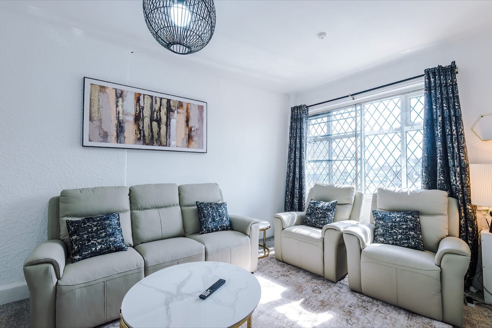 Living room at Luxury 3-Bedroom Apartment