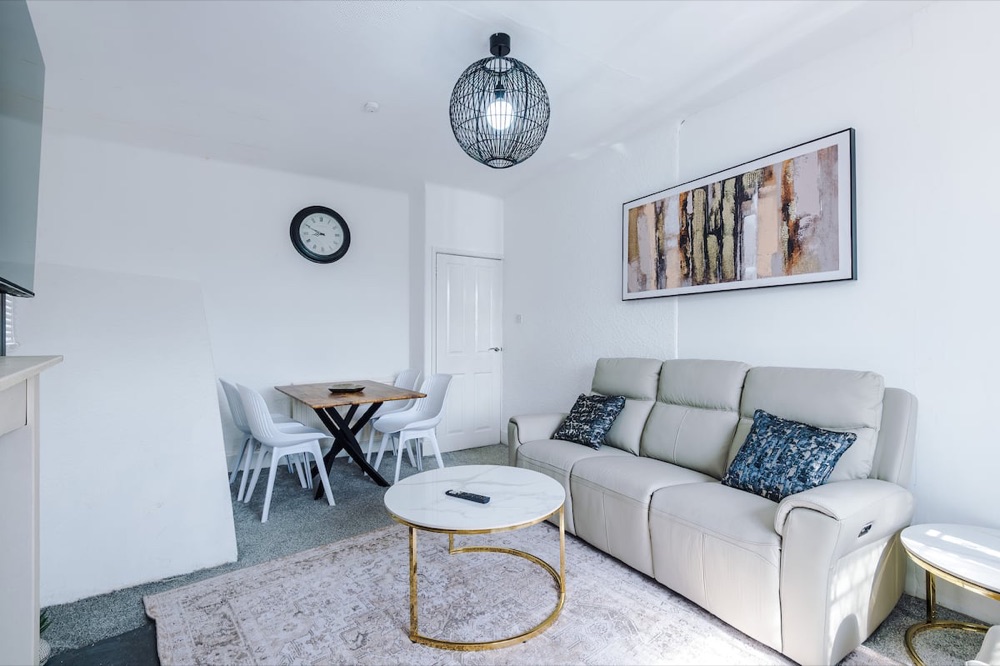 Living room at Luxury 3-Bedroom Apartment