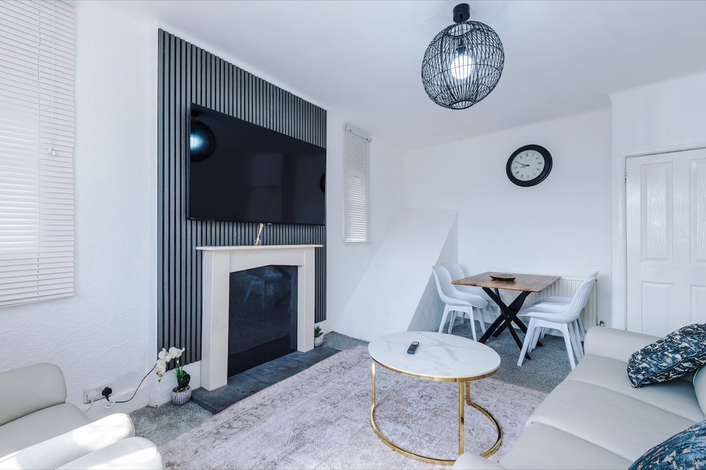 Living room at Luxury 3-Bedroom Apartment